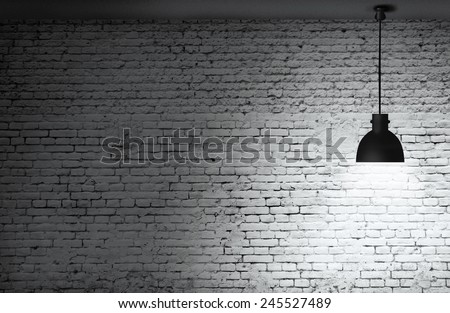 White grunge brick wall and black plafond are lights wall and floor from stone