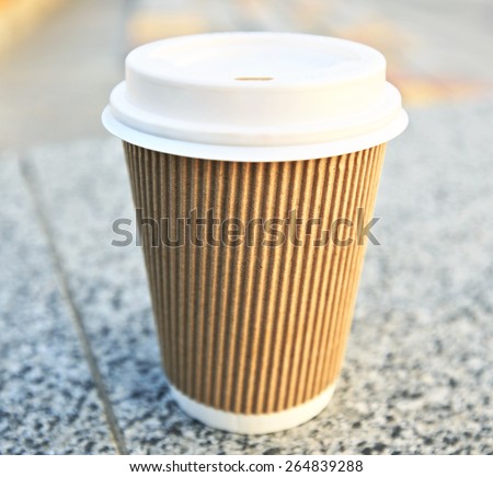 One coffee cup in the city