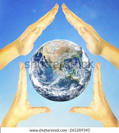 House made of woman hands and earth into on white background. Elements of this image furnished by NASA