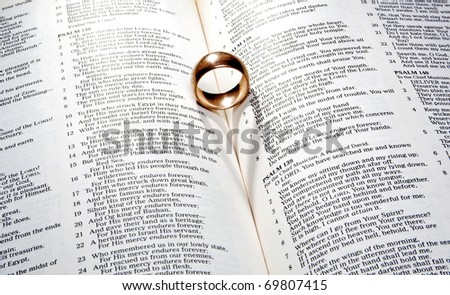 stock photo Wedding Ring on a Bible