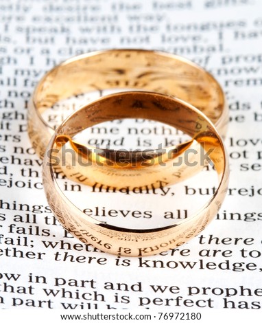stock photo Two wedding rings on a bible