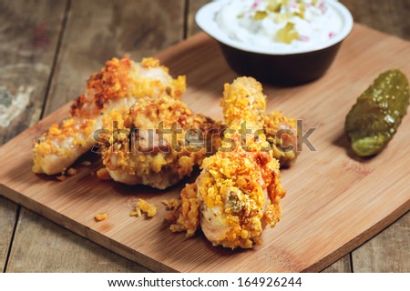 Crispy Deep Fried Chicken Legs with Pickle and Sauce