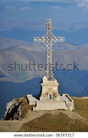 Back view of Caraiman heroes cross monument in Bucegi mountains Romania