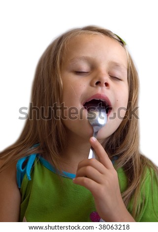 stock photo little girl licking a spoon