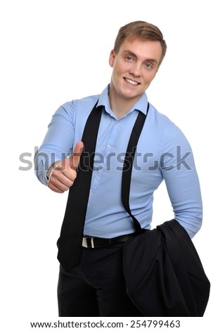 Go hard on your work hours, be relaxed at the end of the day. Portrait of a relaxed smiling businessman showing thumb up.
