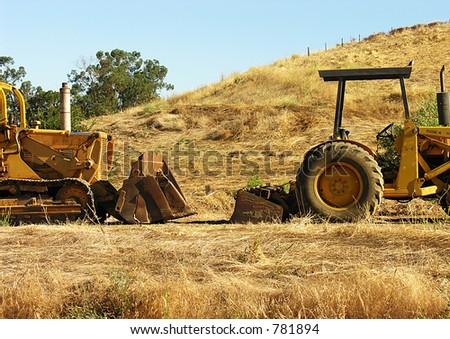A photo of tractors in a construction zone