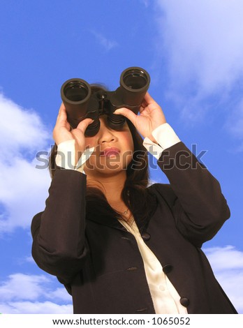 A photo of a business woman searching for something