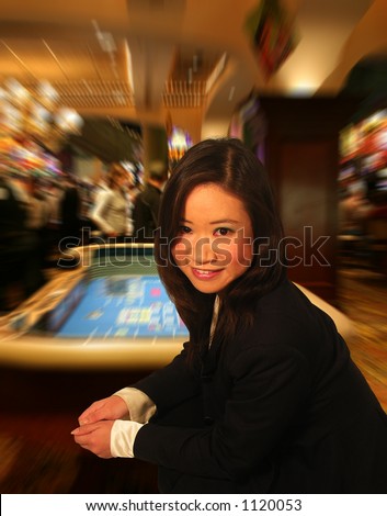 A photo of a woman about to throw the dice in a casino