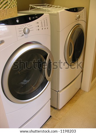 A photo of a washing machine and dryer