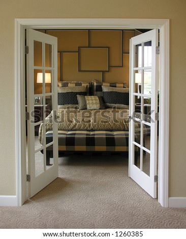 A photo of doors leading to a bedroom