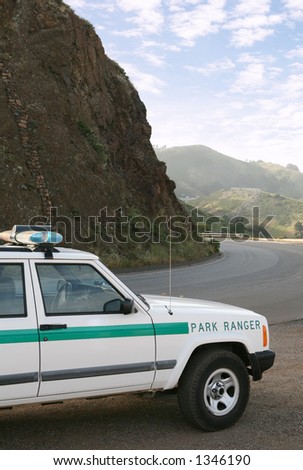 Park Ranger truck with mountain backdrop