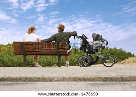 Mom and dad relaxing on a bench 