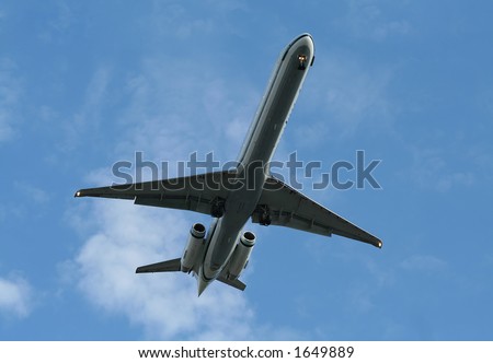 Airplane coming down with its landing gear out