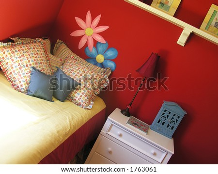 A colorful female bedroom interior