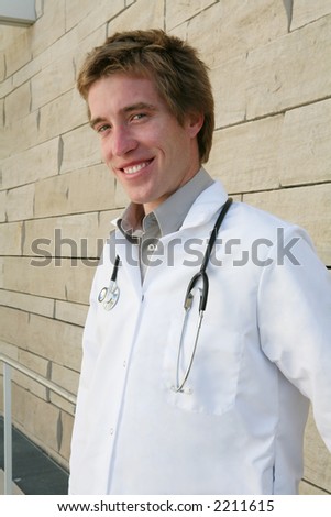 A handsome doctor outside the hospital on the way to work
