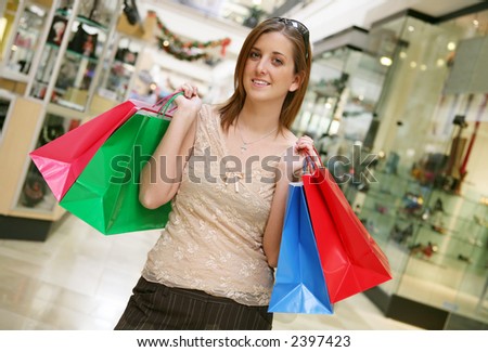 A busy woman shopping for the holidays