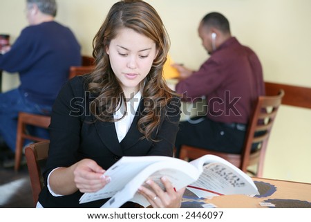 Coffee Shop on Stock Photo   A Pretty Woman Reading A Book Inside A Coffee Shop
