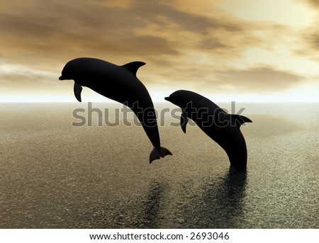 Two dolphins jumping and playing in the ocean