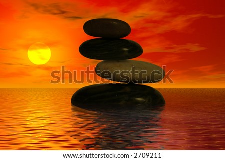Four balanced rocks in the ocean with a beautiful sunset