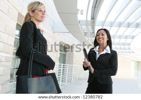 A diverse business woman team at their company