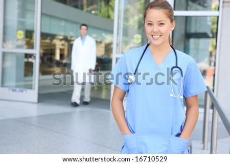 A successful pretty woman nurse outside hospital office building