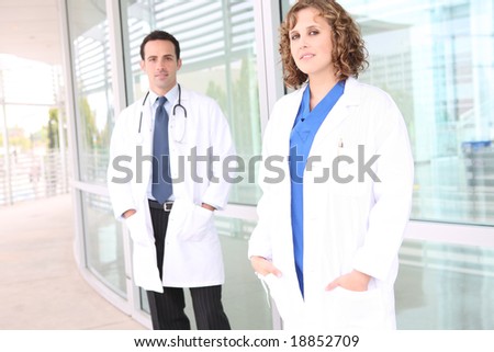 A successful man and woman medical team at hospital building