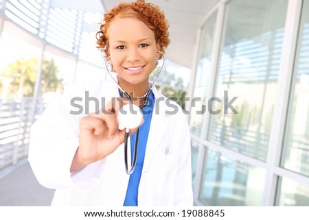 A pretty african american woman nurse at the hospital