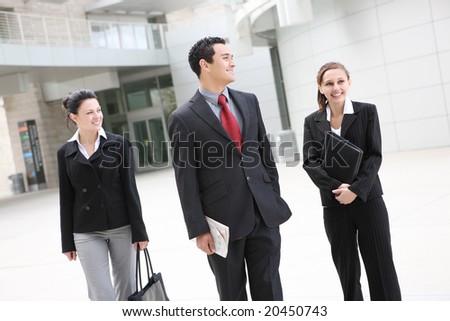 A pretty man and woman business team at office building