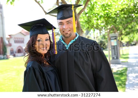 A man and woman couple at college graduation