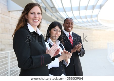 Attractive business man and women team at office building