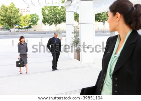A business woman at work waiting for her co-workers
