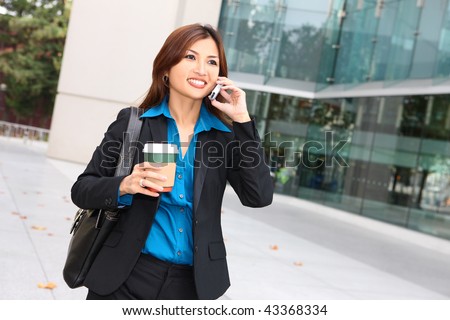 http://image.shutterstock.com/display_pic_with_logo/4884/4884,1261674967,1/stock-photo-a-pretty-asian-business-woman-walking-with-coffee-talking-on-phone-43368334.jpg