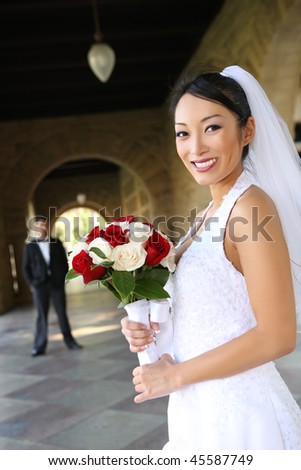 A beautiful bride  church during wedding with man groom in background