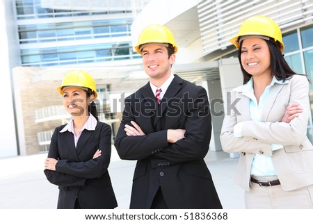 Successful man and woman construction team at work site