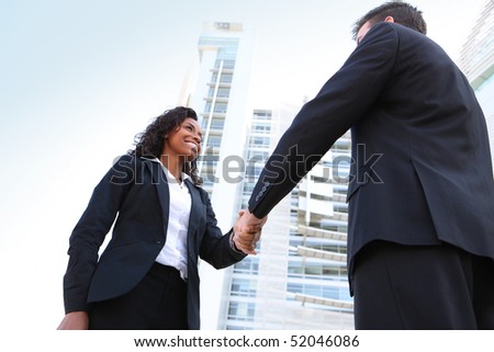 A diverse attractive woman and man business team at office building