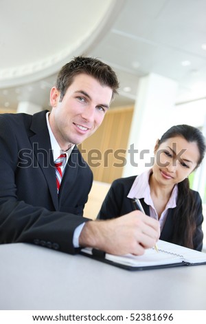 A diverse attractive man and woman business team in meeting
