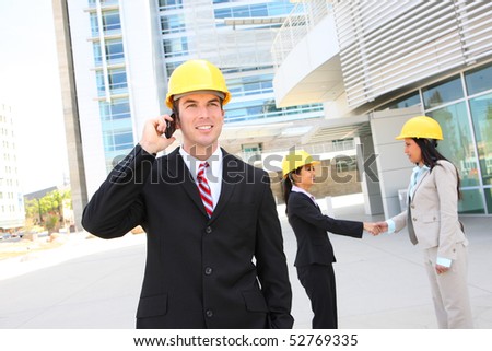 A  business construction man and woman team handshake at work site