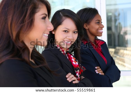 A diverse attractive woman business team at office building