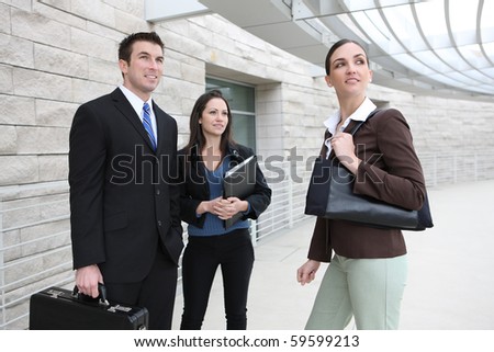 An ethnic man and woman business team at office building