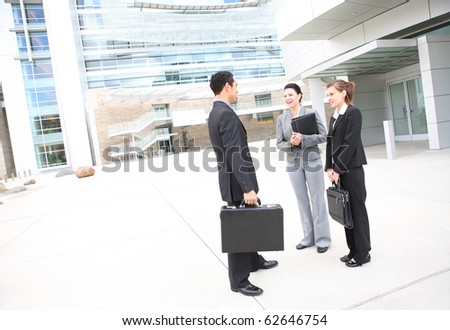 Young man and woman business team at office building