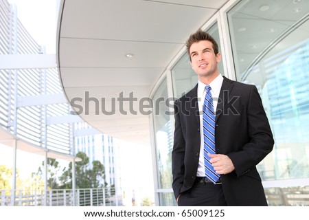 A handsome young business man at office building