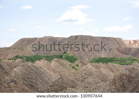 Debris/overburden mountain formed in the process of removal of coal