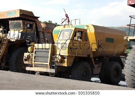 Heavy water tanker to pour water in the mine area