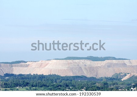 Debris/overburden hillocks formed in the process of removal of coal