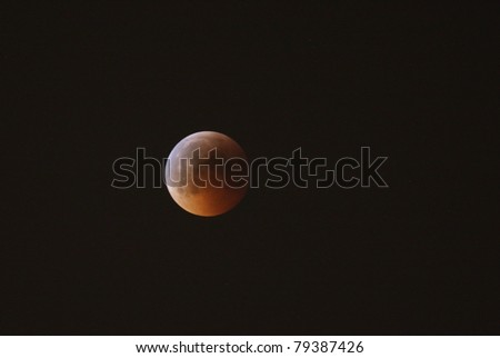 MANAMA, BAHRAIN - APRIL 15-16: Longest lunar eclipse of decade with partial, total and mid eclipse phases observed on June 15-16, 2011 in the sky of Manama, Bahrain. Total eclipse 16 June at 00:01