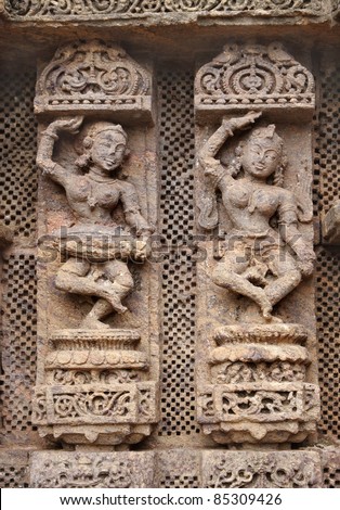 Beautiful carved lady dancer and a musician