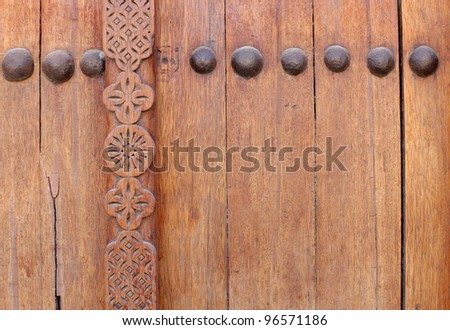 Bolts and beautiful design on ancient door in Riffa fort, Bahrain