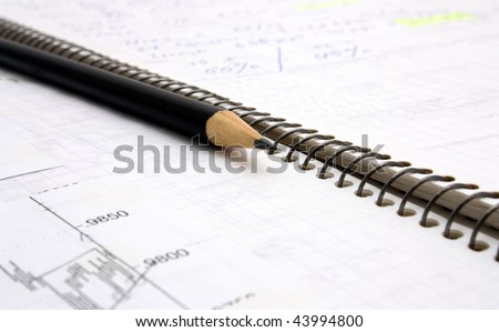 book trader and pencil