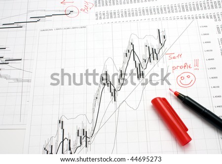 chart and red pen