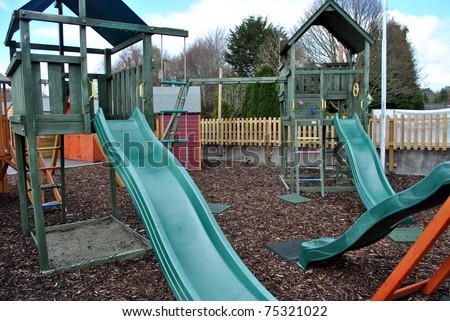 slides and climbing frames at a childrens playground